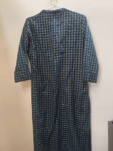 A max black kurta with golden stripes