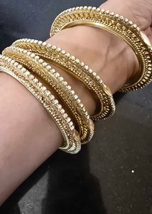 Elegant Gold Bangles with Stones