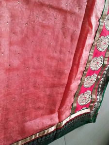 Beautiful netted peach colour Saree