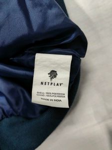 Sleeveless Teal Jacket