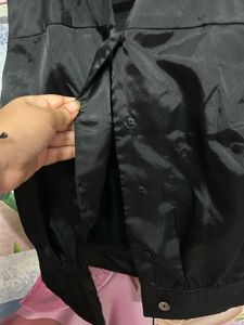 Sleek Black Sleeveless Vest