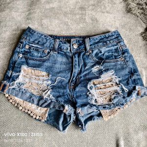 8116. Distressed Denim Shorts with Lace Trim