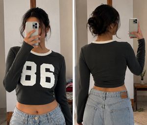 Black "86" Cropped Long Sleeve Top
