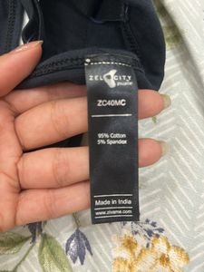 Black Sports Bra with 'RELIVE' Graphic