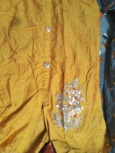 Elegant Yellow Kurta with red skirt
