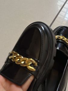 Chic Black Patent Loafers with Gold Chain