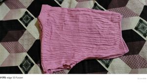 Pink crop top.