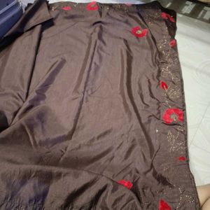 Elegant Brown Saree with Red Blouse