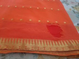 Vibrant Orange Saree with Golden