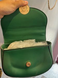 Chic Green Handbag with Gold Accent