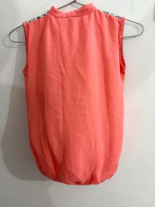 Coral Top with Geometric Print Yoke