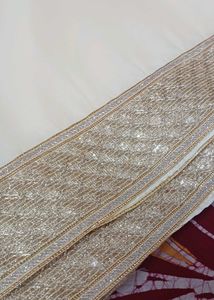 Elegant Cream/Beige Solid  Chiffon Sari with Embel
