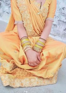 Elegant Yellow Saree with Embellishments
