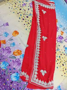 Stunning Reddish Pink Embellished Saree