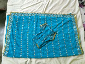 Beautiful Blue Saree with Floral Border