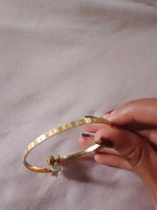 Elegant Gold Bangle with Crystal Accent