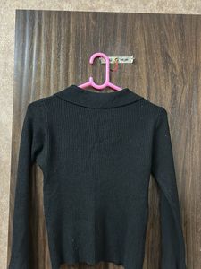 Chic Black Ribbed Bell Sleeve Top