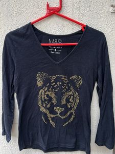 black casual top with embellished tiger imprint
