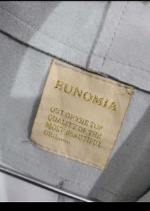 Grey Export branded trenchcoat