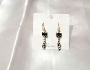 Long Party Wear Designer Earrings Blue Colour Stone
