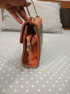 Chic Two-Tone Handbag with Gold Handle