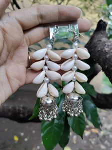 cowrie shells earrings (brings positive vibes and good luck, known as "gift from ocean"