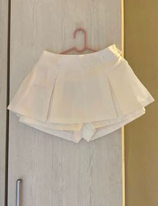 White pleated skort