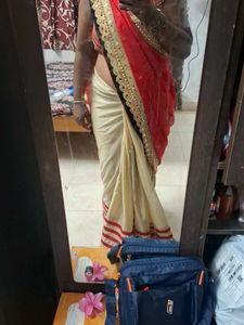 Elegant Red and Cream Saree