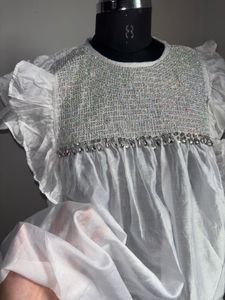 Elegant White Ruffle Top with Embellished Neckline