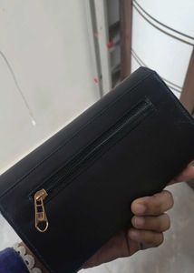Elegant Black Wallet with Gemstone Accent