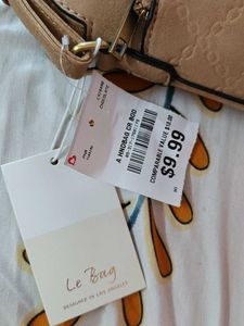 Tan Quilted Crossbody Bag with Dragonfly Charm