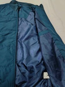 Sleeveless Teal Jacket