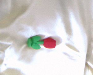Red Tulip Show Case On Table Plus Eraser | Well