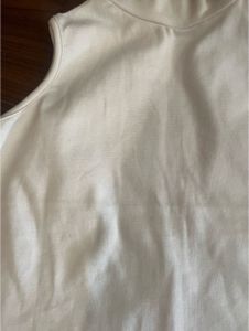 White fitted high-neck sleeveless top