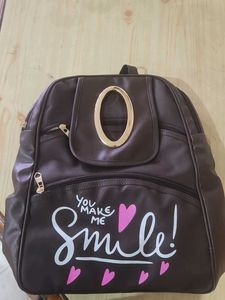 Charming Brown Backpack with "Smile" Print