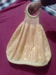Golden Sequence Pottly Beg👝