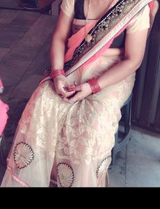 Exquisite Peach and Gold Net Saree