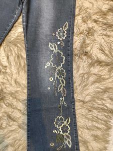 Whimsical Floral Embroidered Denim Jeans
