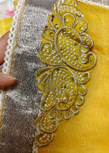 Vibrant Yellow Saree with paisley motifs