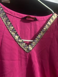 Vibrant Pink Kurta Set with Embellished Neckline