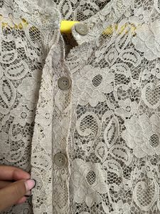 Net Jumpsuit With Bottons In Front To Open