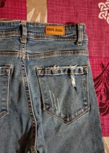 Distressed and flared Blue Denim Jeans