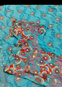 Beautiful Blue Embroidered Saree coin available