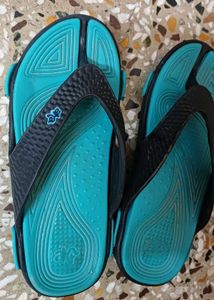 An almost new home slippers for little girls