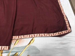 Maroon saree with Embroidered Border