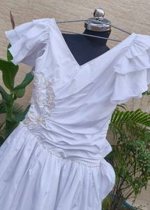 Elegant White Ruffled Gown