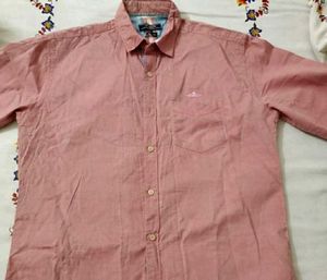 Men's Pink Button-Down Shirt with jeans