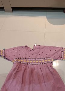 Embroidered Peplum Top