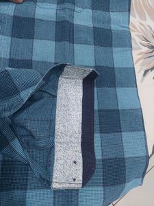blue checkered shirt