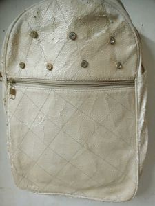 Quilted Backpack with Embellishments